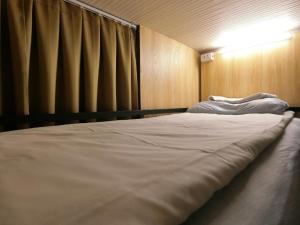 Postel nebo postele na pokoji v ubytování Hermes Hotel