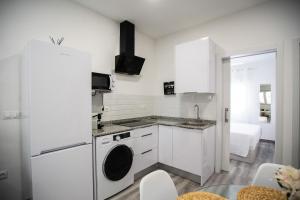 Kuchyň nebo kuchyňský kout v ubytování Apartamentos Linersol