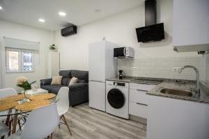 Kuchyň nebo kuchyňský kout v ubytování Apartamentos Linersol