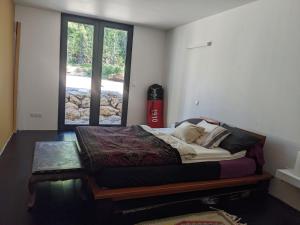 Postel nebo postele na pokoji v ubytování La Maison de Joy dans le Parc des Elfes