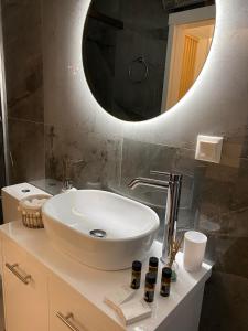 A bathroom at Sofilins Luxury Suite