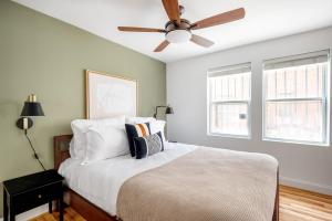 a bedroom with a bed with a ceiling fan at Dupont Circle 1BR nr U St Metro Glens Mkt WDC-179 in Washington, D.C.