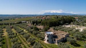 an aerial view of a house with trees and mountains at Tenuta Querce Grosse- Le Dimore in Francavilla al Mare