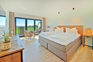 Voodi või voodid majutusasutuse Elbstrand Resort Krautsand - Hotel Elbstrand toas