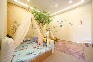 Gloucester Hotel Incheon客房内的一张或多张床位