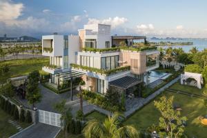 an aerial view of a house with vegetation at Tahagi Villa Tuan Chau Ha Long in Ha Long