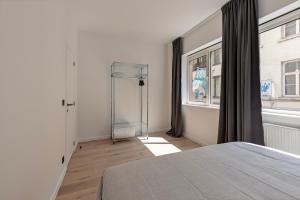 Postel nebo postele na pokoji v ubytování Märch - Mechelen Goat 21