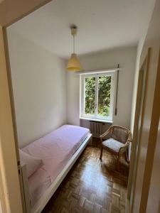 A bed or beds in a room at Cube 1B Flat