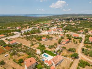 an aerial view of a small village with houses at Villa New Life Zadar in Sukošan