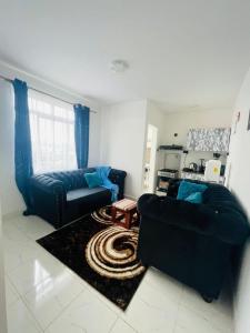 Posezení v ubytování Omuts one bed airbnb with swimmingpool