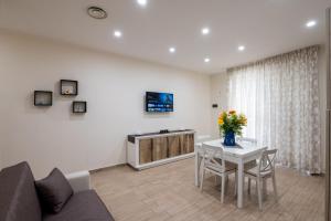 TV a/nebo společenská místnost v ubytování Cavalluccio marino
