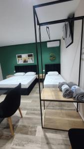 Guest House Tian & Hojz客房内的一张或多张床位