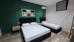 Guest House Tian & Hojz客房内的一张或多张床位