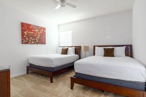 Ein Bett oder Betten in einem Zimmer der Unterkunft Private Pool Homes