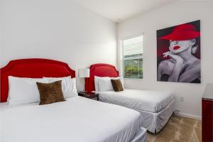 Ein Bett oder Betten in einem Zimmer der Unterkunft Private Pool Homes