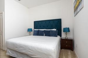 Ein Bett oder Betten in einem Zimmer der Unterkunft Private Pool Homes
