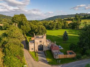 an aerial view of an old castle on a road at Lower Lodge Gatehouse at Kentchurch 