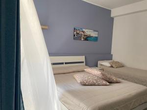 Posteľ alebo postele v izbe v ubytovaní A Casa di Giù B&B