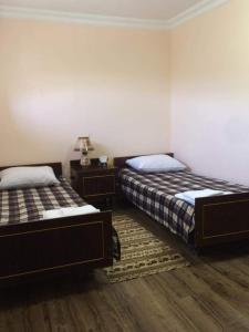 Postel nebo postele na pokoji v ubytování Arpi-Ureni Guesthouse
