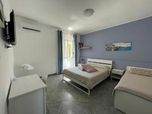 Posteľ alebo postele v izbe v ubytovaní A Casa di Giù B&B