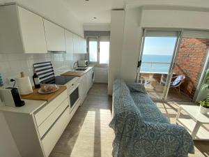 A kitchen or kitchenette at Emilia's Cabin
