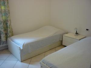 Säng eller sängar i ett rum på Serlio 24 2