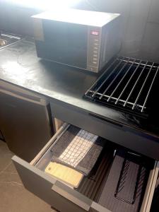 A kitchen or kitchenette at Poem Apartments, Las Canteras