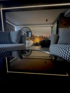 A seating area at Poem Apartments, Las Canteras