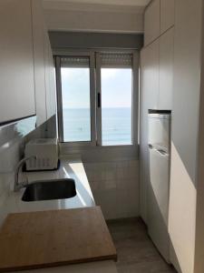 A kitchen or kitchenette at Emilia's Cabin