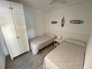 A bed or beds in a room at Emilia's Cabin