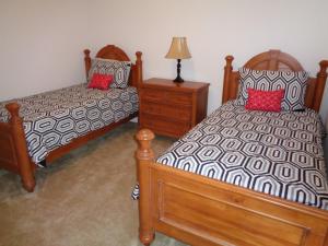 Ein Bett oder Betten in einem Zimmer der Unterkunft Private Pool Homes