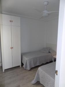 A bed or beds in a room at Emilia's Cabin