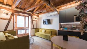 TV/trung tâm giải trí tại Apartamentos Boutique Pinocho - Living Toledo