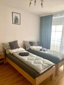 Postel nebo postele na pokoji v ubytování Domek Mustang