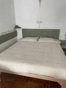 Postel nebo postele na pokoji v ubytování Albergo Mologna