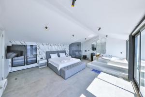 Postel nebo postele na pokoji v ubytování Villa İnfinity Sky + 35 fotografií