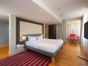 Posteľ alebo postele v izbe v ubytovaní Mercure Warszawa Grand