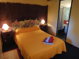 Postel nebo postele na pokoji v ubytování La Picholine chambre Marjolaine