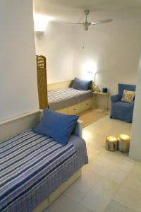 Ένα ή περισσότερα κρεβάτια σε δωμάτιο στο Kalma villa