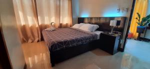 Postel nebo postele na pokoji v ubytování ISLAND VIEW SUITES