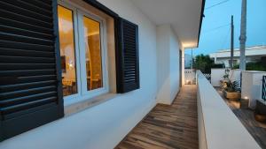 Balkón nebo terasa v ubytování Helianthus Rooms + 22 fotografií