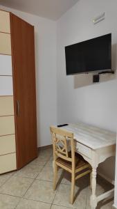 TV a/nebo společenská místnost v ubytování Helianthus Rooms