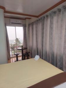 Postel nebo postele na pokoji v ubytování ISLAND VIEW SUITES