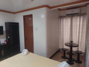 Postel nebo postele na pokoji v ubytování ISLAND VIEW SUITES