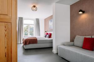 Postel nebo postele na pokoji v ubytování B&B Brasserie Villare