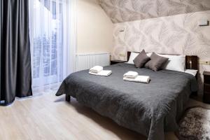 Postel nebo postele na pokoji v ubytování Lidia chalets + 18 fotografií