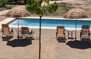 The swimming pool at or close to Castillo de Bulbuente de Luis Zueco