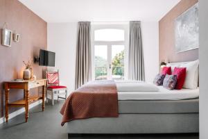 Postel nebo postele na pokoji v ubytování B&B Brasserie Villare