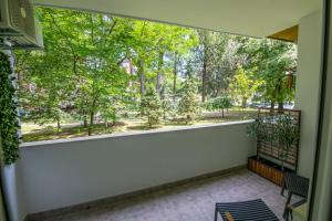 a balcony with a view of a park at BNF Lounge in Varaždin