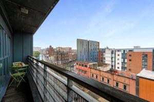 a balcony with a view of a city at Host & Stay - Knowledge Quarter Apartment in Liverpool
